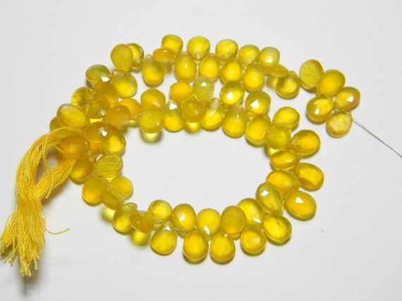 Manufacturers Exporters and Wholesale Suppliers of Yellow Chalcydony Faceted Pear Briolettes Jaipu Rajasthan
